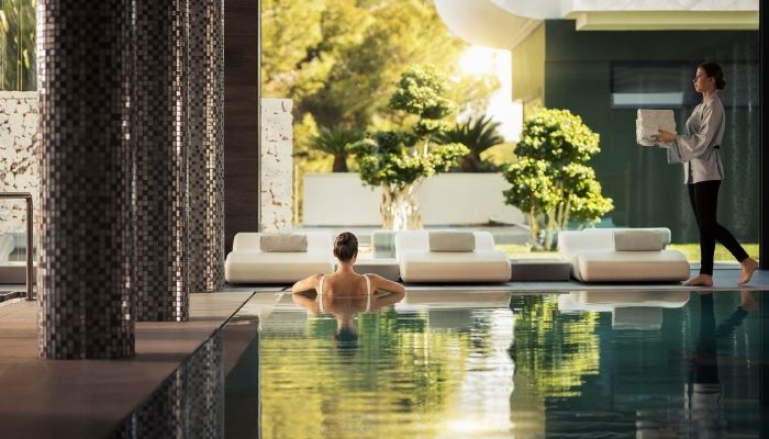 Lady in a pool at SHA Wellness Clinic, Spain