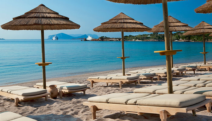 Private Beach and sun loungers at Hotel Romazzino, Costa Smeralda, Italy