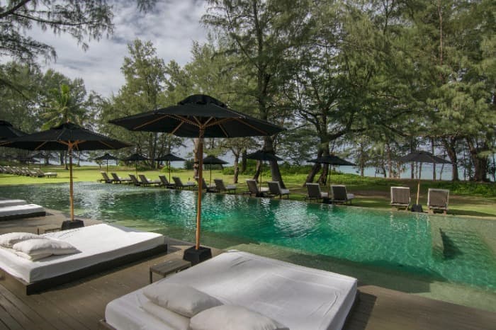 Poolside beds at SALA Phuket in Thailand