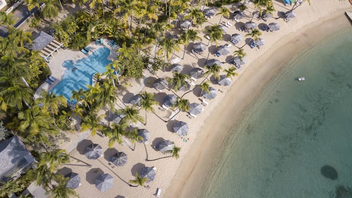 Aerial overview of the beautiful beach at curtain bluffs in Antigua