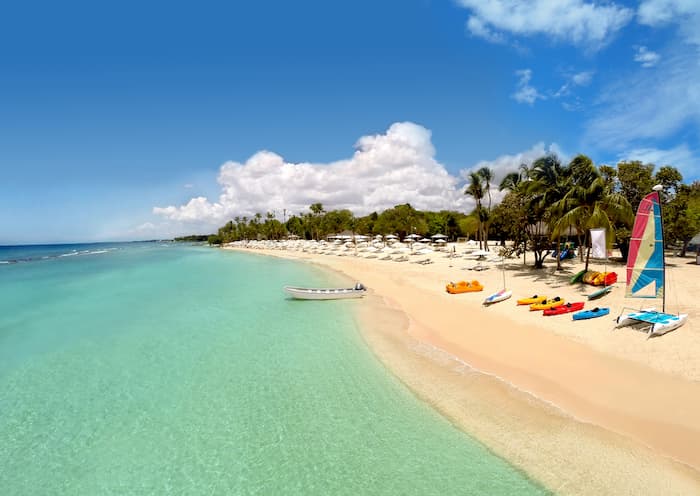 Beachside with water sports facilities including canoes and catamaran