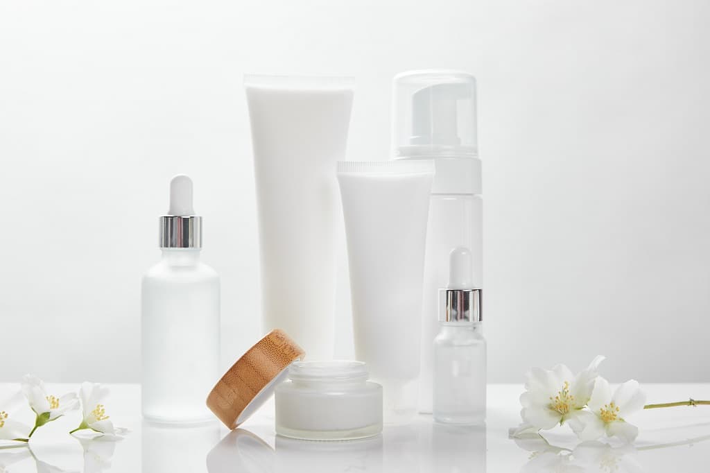 Beauty products in reusable bottles 