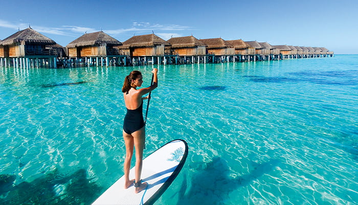 Paddle boarding at Constance Moofushi, Maldives