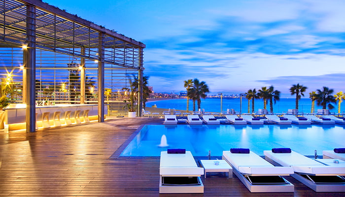 Evening at the rooftop pool at W Barcelona Hotel, Spain