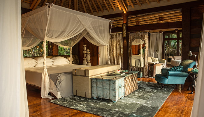 Villa bedroom at North Island Hotel, Seychelles