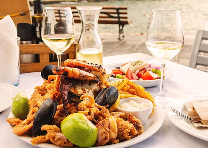 Authentic seafood platter served in restaurant, Corfu, Greece.