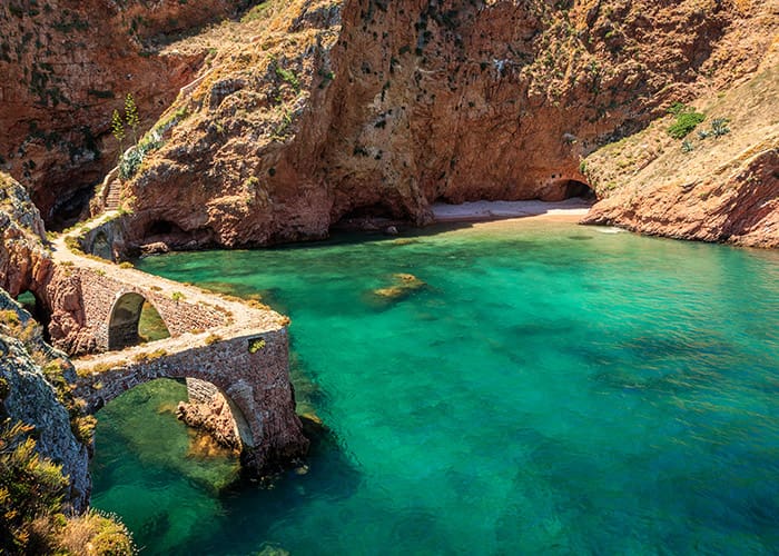 Access bridge to Berlengas surrounded by crystal water, Portugal