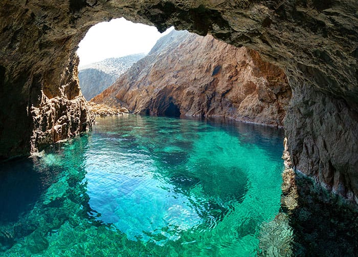 Cave in Tragonisi Island Caverns in Mykonos, Greece