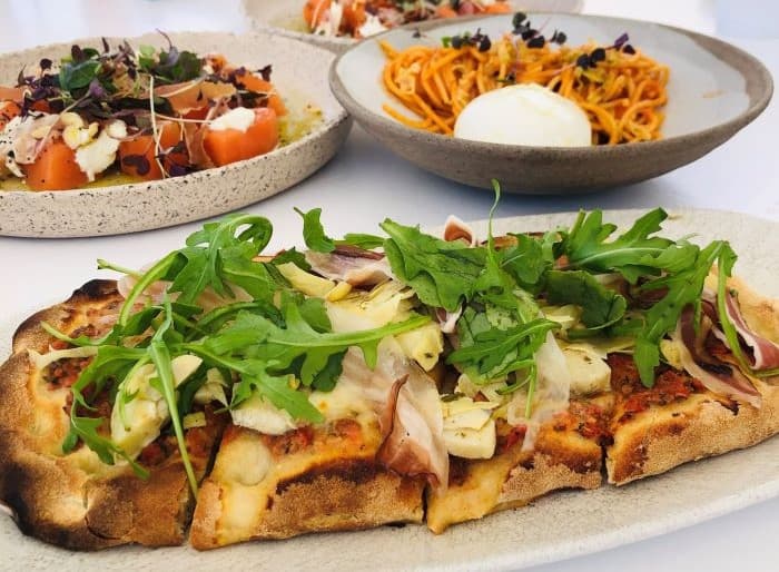 Topped flatbread at Bousoulas Beach Bar